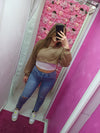 Jeans skinny con strappo